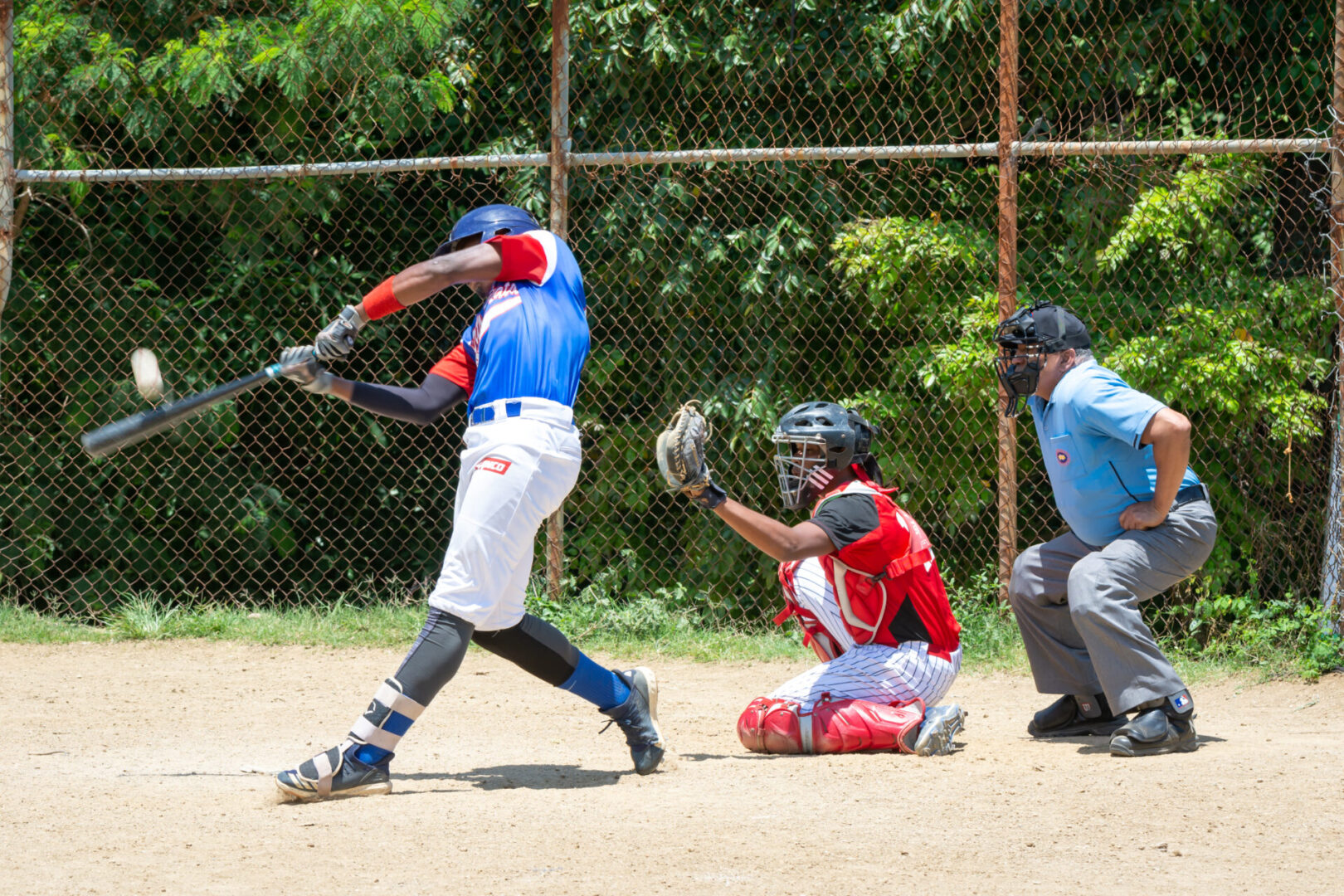 Three kids during a baseball game